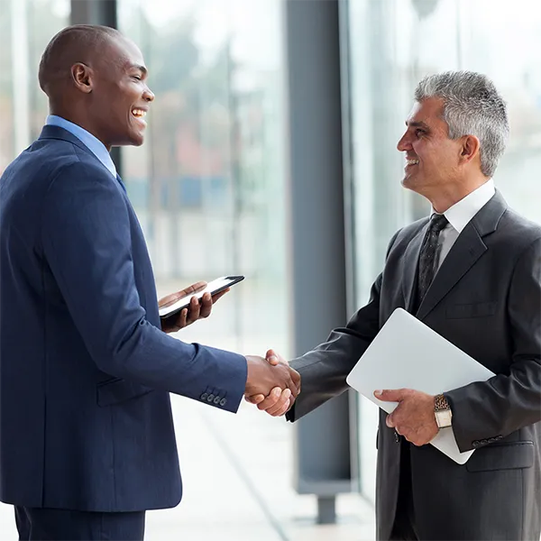 Two professionals shaking hands.