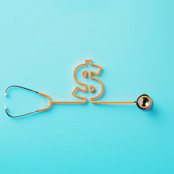 A stethoscope with its cord bent into the shape of a dollar sign.