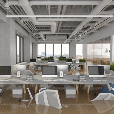 office tables and chairs submerged in flood water