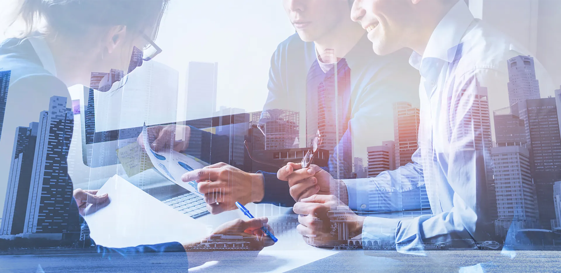A double exposure of a city skyline with a group of professionals reviewing reports.