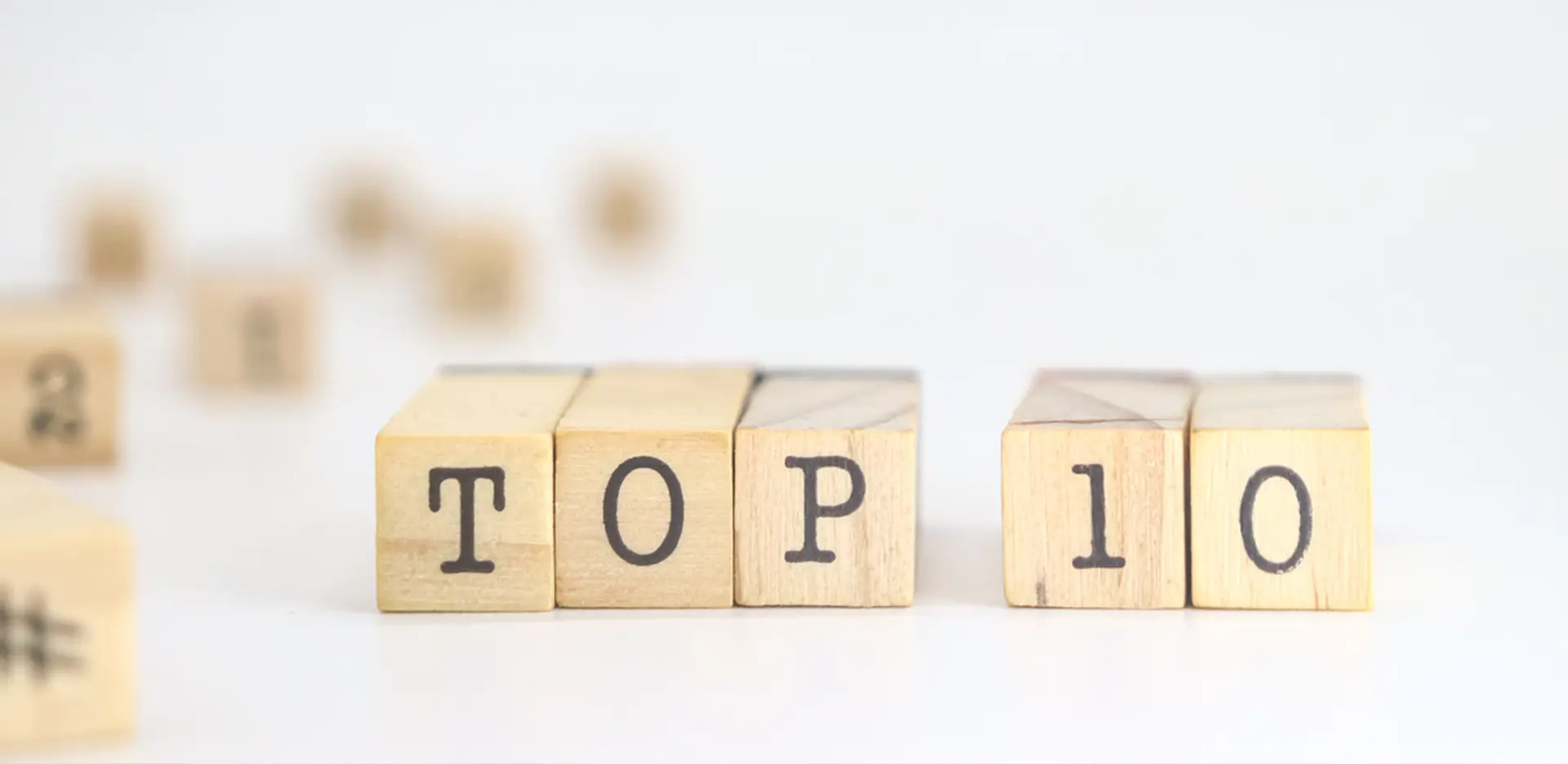Wooden blocks with letter reading Top 10
